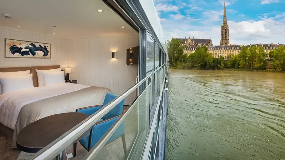 river cruise boat view of cabin and european gothic church in background