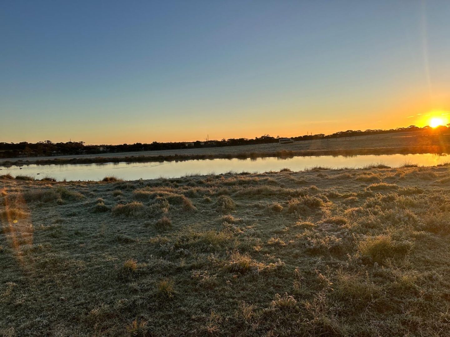 Sunrise over the waterhole at Monarto Safari Park